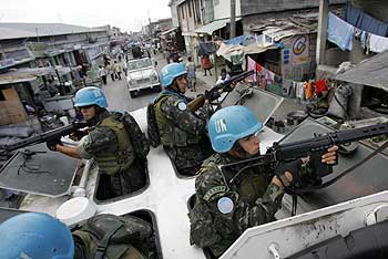 un, united nations, vehicles, weapons